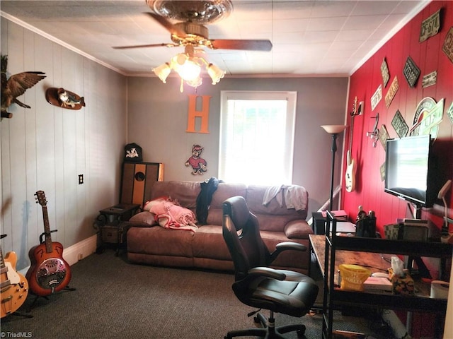 living area featuring ornamental molding, carpet, and ceiling fan