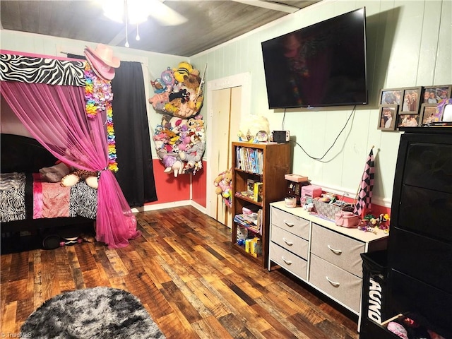 bedroom with wood finished floors