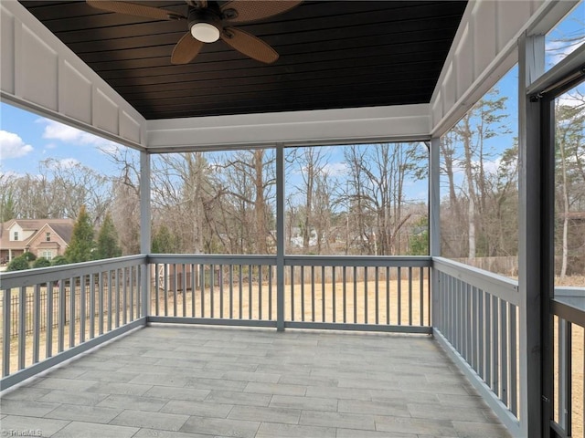 wooden terrace with ceiling fan