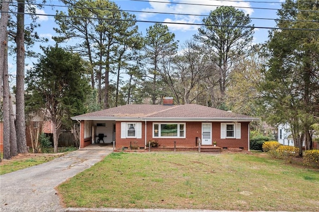 ranch-style home featuring driveway, a front lawn, crawl space, and a chimney