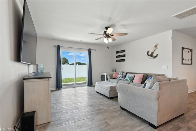 4514 Heatherly Rd, Winston-Salem, NC 27105 - living room with a ceiling fan and light wood-style flooring