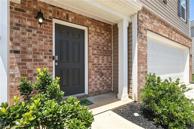 4514 Heatherly Rd, Winston-Salem, NC 27105 - doorway to property featuring brick siding and covered porch