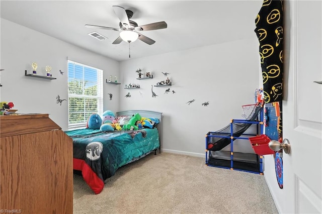 4514 Heatherly Rd, Winston-Salem, NC 27105 - carpeted bedroom with baseboards and a ceiling fan