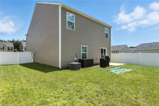 4514 Heatherly Rd, Winston-Salem, NC 27105 - rear view of house with a fenced backyard and a patio area