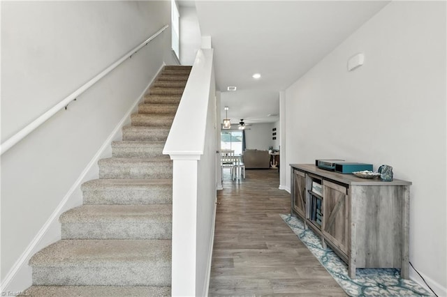4514 Heatherly Rd, Winston-Salem, NC 27105 - stairway featuring wood finished floors, recessed lighting, and a ceiling fan