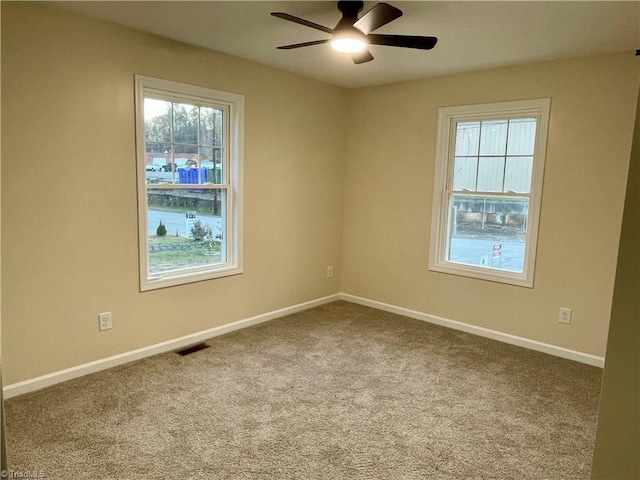 319 E 3rd Ave Extension, Lexington, NC 27292 - empty room featuring ceiling fan and carpet flooring