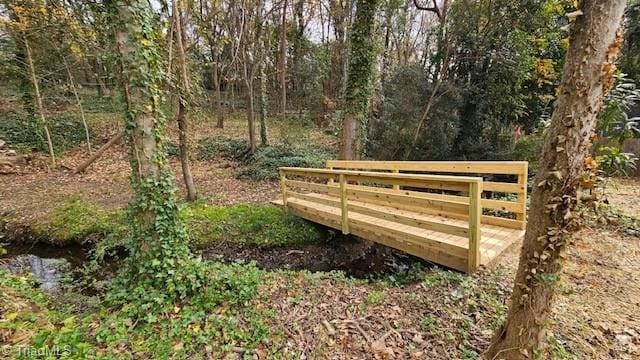 319 E 3rd Ave Extension, Lexington, NC 27292 - gate featuring a view of trees
