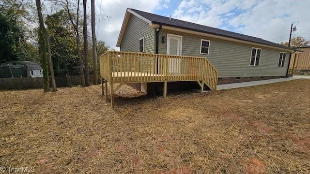 319 E 3rd Ave Extension, Lexington, NC 27292 - rear view of house with crawl space and a wooden deck