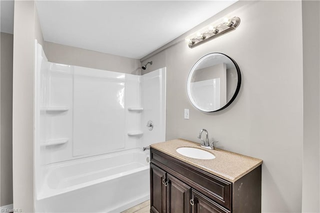 bathroom with vanity and shower / bath combination