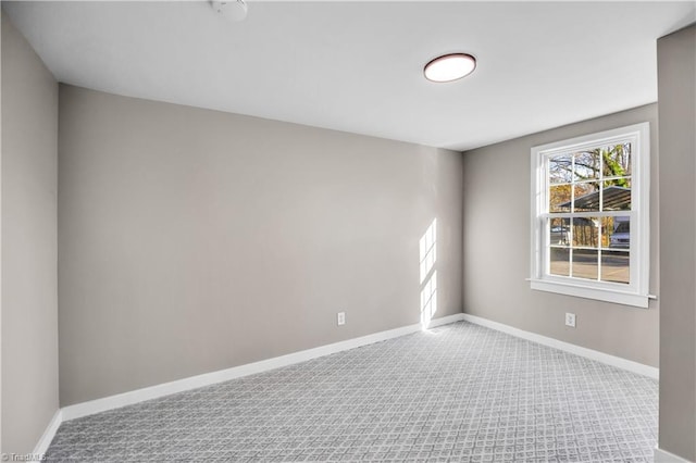 empty room featuring carpet flooring