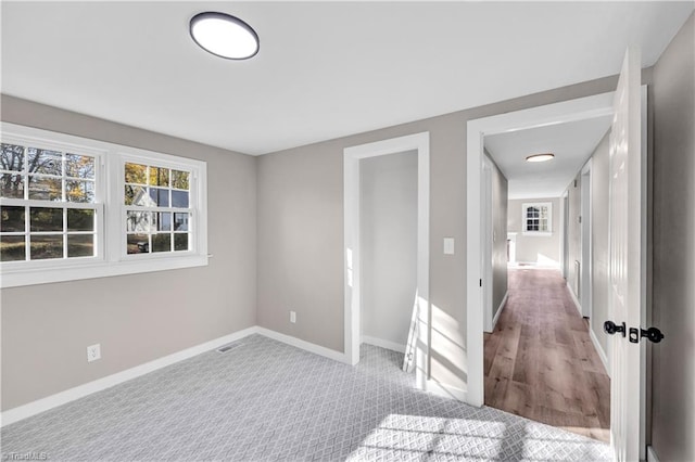 empty room featuring light hardwood / wood-style floors