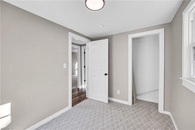 unfurnished bedroom featuring a closet