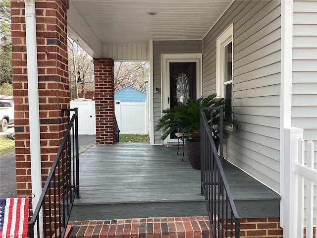 property entrance featuring covered porch