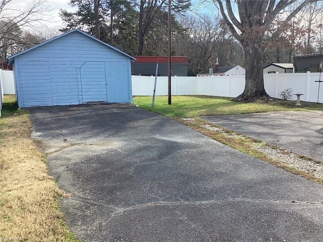 garage with a yard