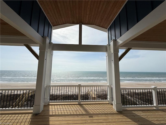 3048 Island Dr, Northtopsail Beach, NC 28460 - wooden deck with a water view and a beach view
