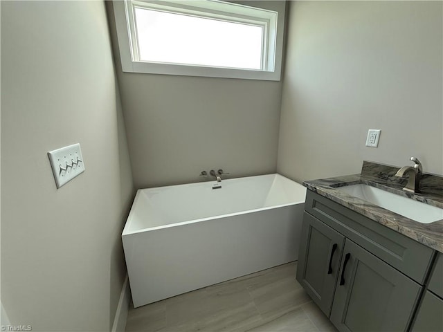 3048 Island Dr, Northtopsail Beach, NC 28460 - full bath with a soaking tub and vanity