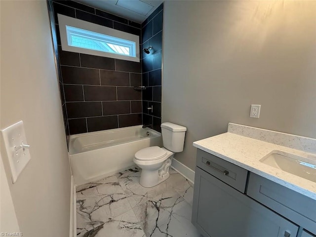 3048 Island Dr, Northtopsail Beach, NC 28460 - bathroom featuring vanity, toilet, baseboards, bathing tub / shower combination, and marble finish floor