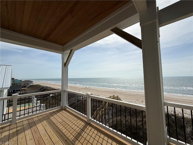 3048 Island Dr, Northtopsail Beach, NC 28460 - wooden terrace featuring a view of the beach and a water view