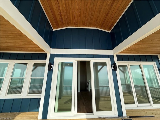 3048 Island Dr, Northtopsail Beach, NC 28460 - view of exterior entry featuring board and batten siding