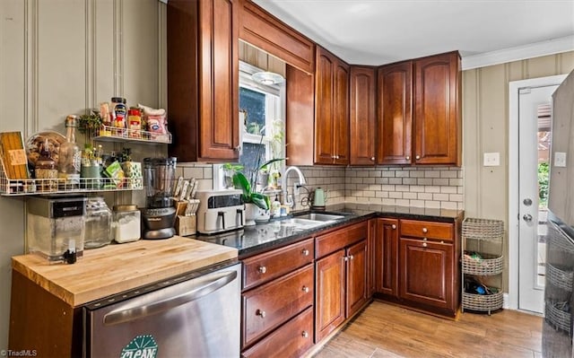 3941 Vest Mill Rd, Winston-Salem, NC 27103 - kitchen with dishwasher, a sink, decorative backsplash, light wood-style floors, and wood counters