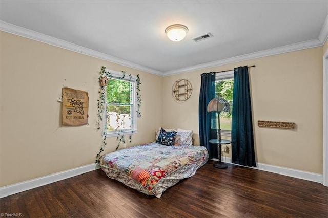 3941 Vest Mill Rd, Winston-Salem, NC 27103 - bedroom featuring multiple windows, ornamental molding, baseboards, and wood finished floors