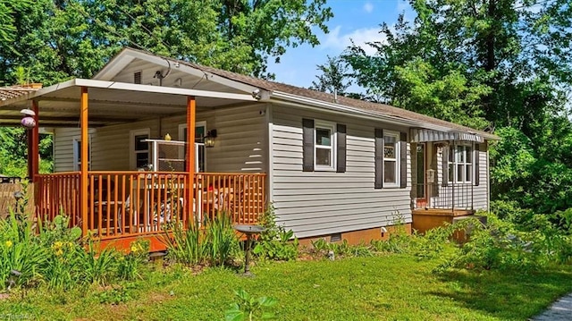 3941 Vest Mill Rd, Winston-Salem, NC 27103 - view of front of home with crawl space and a deck