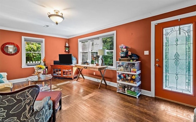 3941 Vest Mill Rd, Winston-Salem, NC 27103 - living room featuring crown molding, wood-type flooring, and baseboards