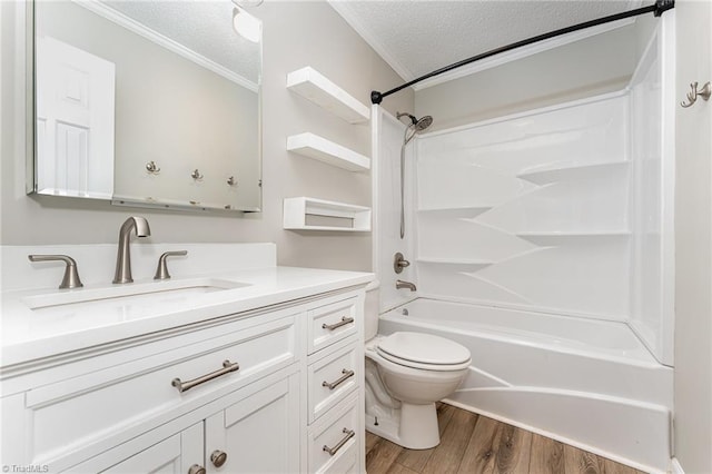 4104 Old Greensboro Rd, Winston-Salem, NC 27101 - bathroom with a textured ceiling, crown molding, toilet, wood finished floors, and vanity
