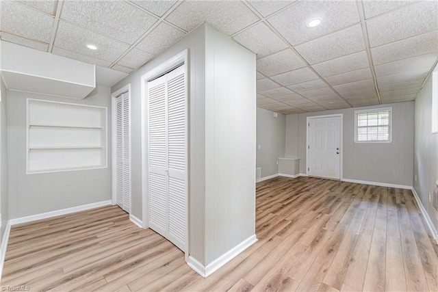 4104 Old Greensboro Rd, Winston-Salem, NC 27101 - hall with wood finished floors, built in shelves, baseboards, a paneled ceiling, and recessed lighting