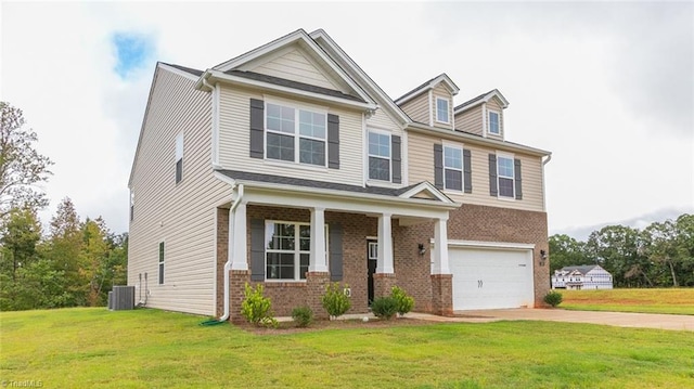 craftsman house featuring central AC unit, a garage, a front yard, and a porch