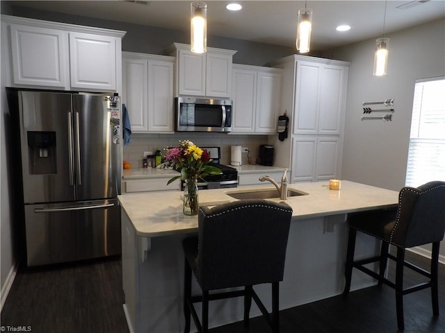 5304 Smoky Ridge Ln, Winston-Salem, NC 27127 - kitchen with appliances with stainless steel finishes, a sink, white cabinetry, and recessed lighting