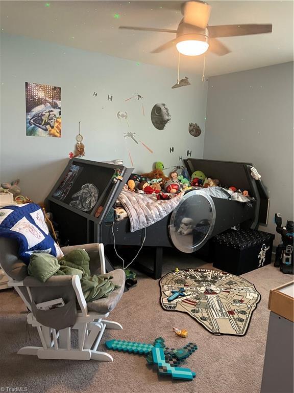 5304 Smoky Ridge Ln, Winston-Salem, NC 27127 - bedroom with carpet and a ceiling fan