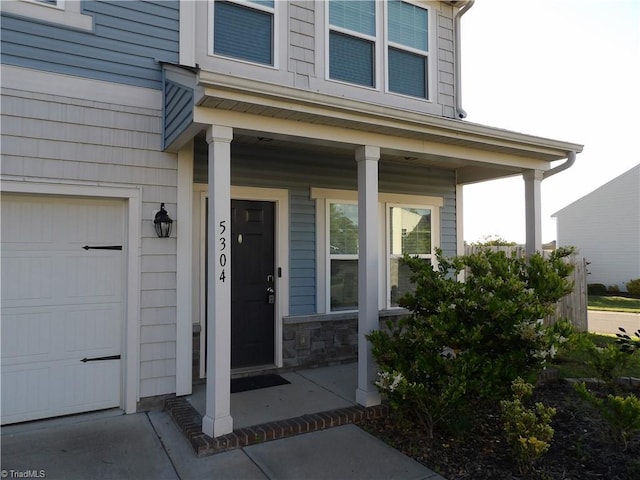 5304 Smoky Ridge Ln, Winston-Salem, NC 27127 - view of exterior entry with a porch