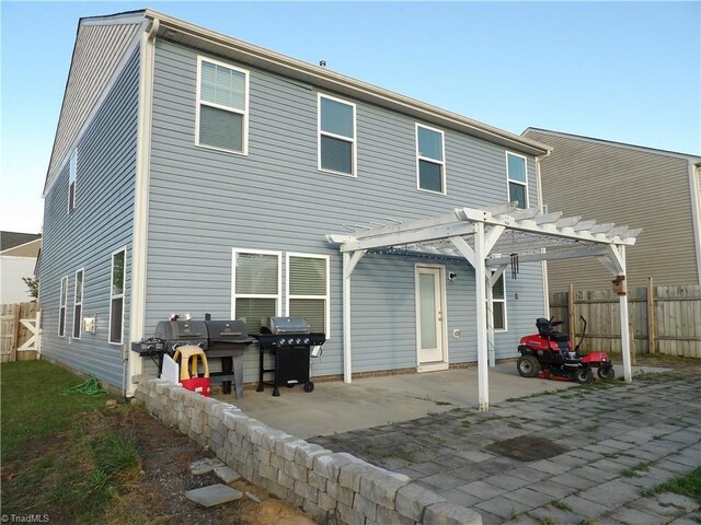 5304 Smoky Ridge Ln, Winston-Salem, NC 27127 - rear view of property featuring a pergola and a patio area