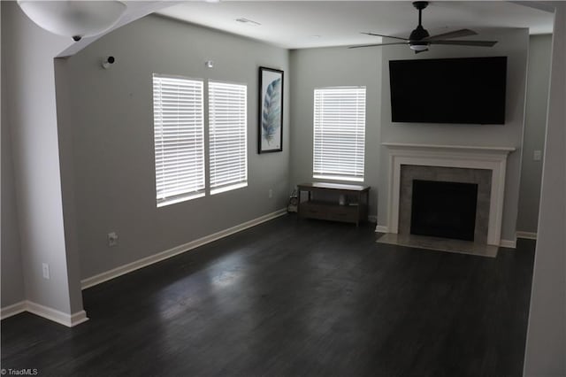 5304 Smoky Ridge Ln, Winston-Salem, NC 27127 - unfurnished living room featuring ceiling fan, dark wood-type flooring, a fireplace, and baseboards