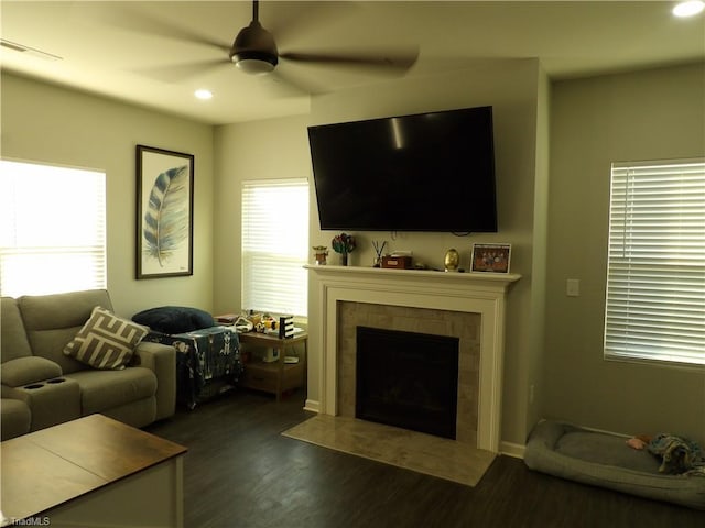 5304 Smoky Ridge Ln, Winston-Salem, NC 27127 - living room featuring a tiled fireplace, ceiling fan, dark wood-style floors, and recessed lighting