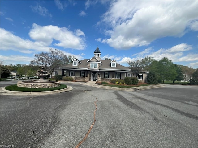 view of front of home featuring stone siding