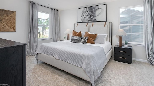2124 Monk Dr, Haw River, NC 27258 - bedroom with light carpet and baseboards