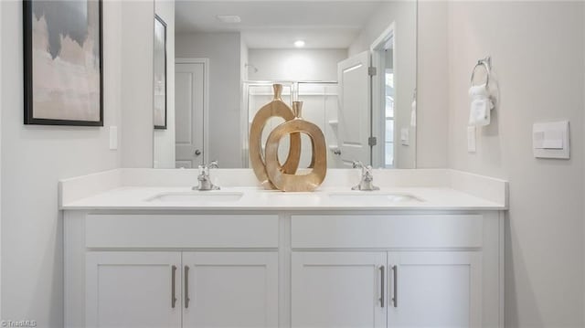 2124 Monk Dr, Haw River, NC 27258 - bathroom featuring a shower stall and double vanity