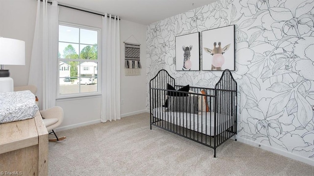 2124 Monk Dr, Haw River, NC 27258 - carpeted bedroom with a nursery area and baseboards