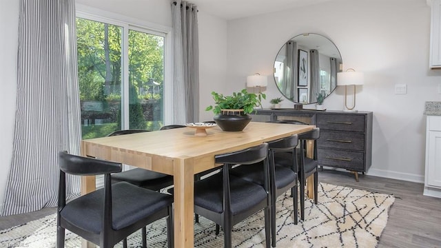2124 Monk Dr, Haw River, NC 27258 - dining space with wood finished floors and baseboards