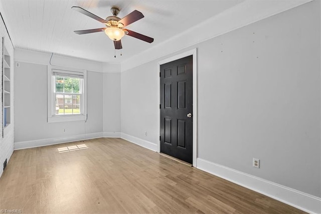 407 Pinedale Dr, Reidsville, NC 27320 - empty room with wood finished floors and a ceiling fan