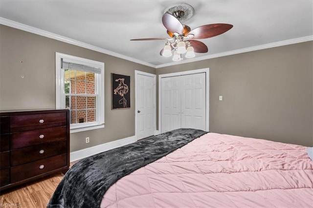 407 Pinedale Dr, Reidsville, NC 27320 - bedroom with ornamental molding, wood finished floors, and a ceiling fan