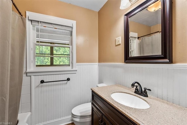 407 Pinedale Dr, Reidsville, NC 27320 - bathroom with wainscoting and vanity
