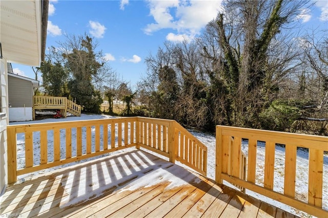 view of snow covered deck