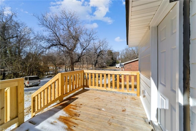 view of snow covered deck