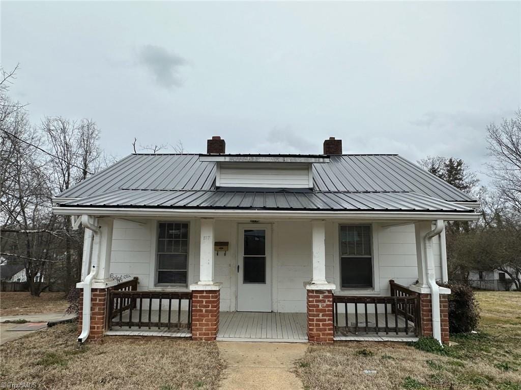 bungalow-style home with covered porch