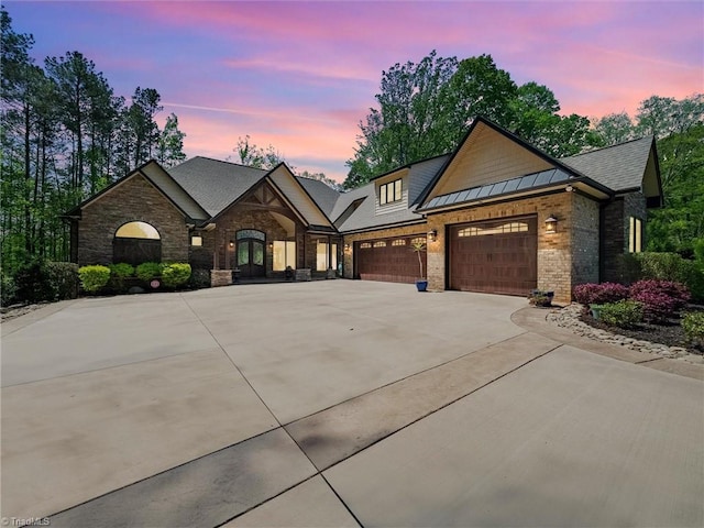 1579 Sunset Pointe Dr, Salisbury, NC 28146 - view of front of property featuring an attached garage, driveway, brick siding, and stone siding