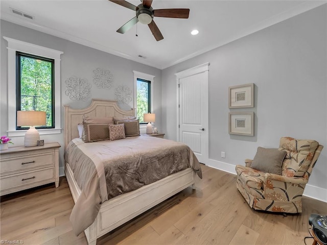 1579 Sunset Pointe Dr, Salisbury, NC 28146 - bedroom with light wood-style flooring, visible vents, and multiple windows
