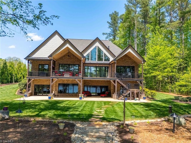 1579 Sunset Pointe Dr, Salisbury, NC 28146 - rear view of property featuring stairway, brick siding, and a patio